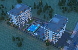 Просторные апартаменты со студией в новой качественной резиденции с бассейнами и садом, в 200 метрах от пляжа, Аланья, Турция за $502 000