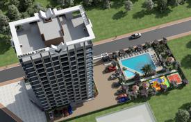 Двухкомнатные апартаменты в комплексе с бассейном и спортивными площадками, Мерсин, Турция за От $82 000