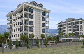 Различные апартаменты в новой качественной резиденции с бассейнами и садом, в 200 метрах от пляжа, Аланья, Турция за $234 000
