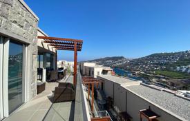 Меблированные квартиры в Ялыкавак Бодрум с видом на море, балконом и террасой, в элитном комплексе с песчаным пляжем и причалом, рестораном за $645 000