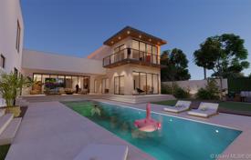 Современная вилла с задним двором, бассейном, террасой и двумя гаражами, Майами-Бич, США за 7 031 000 €