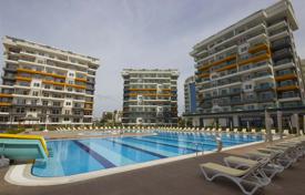 Меблированные апартаменты с сауной и джакузи в новой резиденции с бассейном, теннисным кортом и парковкой, Авсаллар, Турция за $85 000