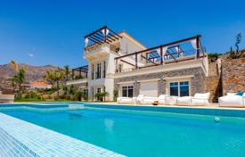 Уютная вилла с частным пляжем, гостевым домиком, бассейном, видом на море и большим участком, Элунда, Крит, Греция за 5 800 000 €