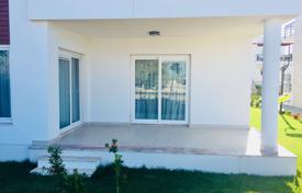 Комфортабельная квартира 2+1 с террасой и выходом в сад на берегу Средиземного моря в районе Бодрум за 234 000 €