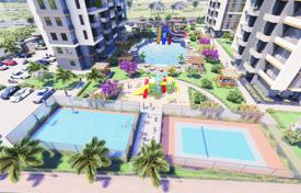 Трёхкомнатные апартаменты в комплексе с бассейном и теннисным кортом, 500 метров до моря и пляжей, Мерсин, Турция за От $85 000