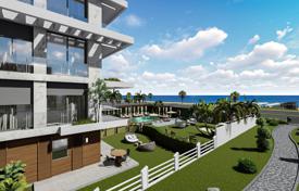 Трехкомнатные квартиры в новой резиденции на берегу моря с бассейном и круглосуточной охраной, Кестель, Аланья, Турция за $251 000