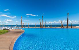 Комфортабельные апартаменты с парковкой, террасой и видом на море в доме с бассейнами и садом, Пунта-Прима, Испания за 409 000 €