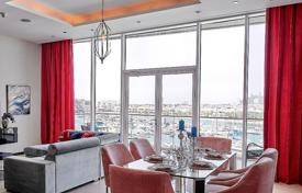 Четырехкомнатная квартира в резиденции с бассейном и прямым выходом на пляж, Пальма Джумейра, Дубай, ОАЭ за 2 330 € в неделю