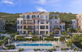 Новая резиденция в большом элитном кластере на берегу моря с пляжами, гаванью и полем для гольфа, Тиват, Черногория за От 588 000 €