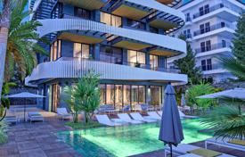 Высококачественные квартиры в новой резиденции с бассейном, садом и парковкой, напротив пляжа, Кестель, Турция. Цена по запросу