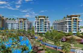 Новые просторные апартаменты в большой резиденции с отелем, аквапарками и луна-парком, в 300 метрах от моря, Аланья, Турция за $213 000