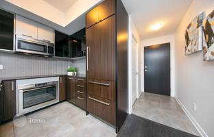 1-комнатная квартира в Янг-стрит за C$1 015 000