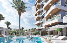 Двухкомнатная квартира в новой резиденции с бассейнами, теннисным кортом и круглосуточной охраной, Махмутлар, Турция за 129 000 €