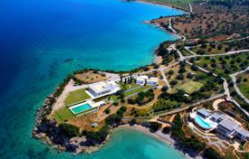 Уединенная элитная вилла с собственным пляжем, бассейном и двумя гостевыми домами на полуострове, Порто Хели, Греция за 38 500 € в неделю
