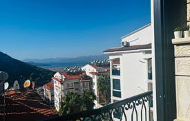 Двухуровневые апартаменты в Фетхие с видом на море, балконом и общим бассейном за $199 000