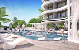 Новые апартаменты с балконом в охраняемой резиденции с бассейнами, тренажерным залом и садом, Аланья, Турция за $389 000
