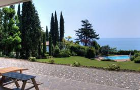Вилла с парком, бассейном, частным пляжем с пирсом, Манерба-дель-Гарда, Брешиа, Италия за 7 500 000 €