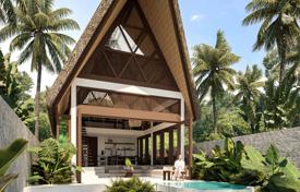 Двухуровневая вилла с открытой спальней в окружении тропических пальм на острове Ломбок за $181 000