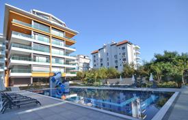 Двухкомнатная квартира в качественной резиденции с бассейном и кинотеатром, прямо напротив пляжа, Кестель, Алания, Турция за $113 000