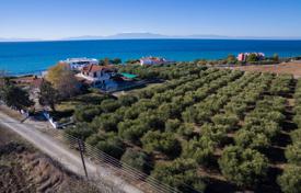 Земельный участок с оливковой рощей в 150 метрах от моря, Мудания, Греция за 410 000 €