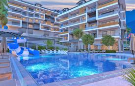 Красивые квартиры в новой резиденции с бассейном, садом и парковкой, в центре Аланьи, Турция за $315 000