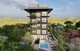 Новый жилой комплекс с бассейном и кинотеатром в 200 метрах от моря, Кестель, Турция за От $272 000