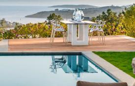 Трехкомнатные двухуровневые апартаменты с видом на море и 4-комнатные виллы в Бодруме с видом на его замок и греческий остров Кос за $2 430 000