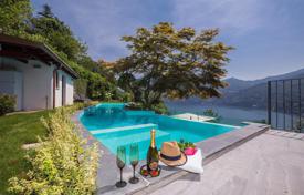 Современная вилла с панорамным видом на озеро Комо, Ларио, Ломбардия, Италия за 4 900 € в неделю