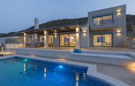 Элитная вилла с террасой, бассейном, видом на море и просторным участком, на первой линии от пляжа, Мохлос, Крит, Греция за 3 500 000 €