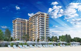 Новый жилой комплекс класса люкс на первой линии моря в курортном городе Махмутлар, Турция за От $232 000