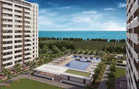 Новая резиденция с аквапарком, бассейнами и теннисным кортом в 150 метрах от пляжа Мерсин, Турция за От $103 000