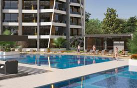 Апартаменты на стадии строительства в Анталии, в комплексе с 2 бассейнами, спа и фитнес центрами баскетбольной площадкой подземной парковкой за $211 000