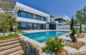 Новая трёхэтажная вилла с видом на море и горы в Финестрате, Аликанте, Испания за 1 800 000 €