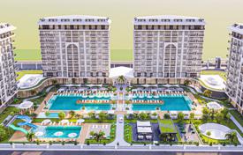 Новый элитный жилой комплекс с бассейнами, аквапарком и теннисным кортом рядом с морем, Аланья, Турция за От $98 000